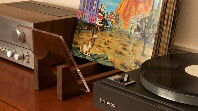 The KAIU Vinyl Record Storage Holder has a small footprint, but elegantly holds up to 50 albums, and makes it easy to flip between them to find the one you’re looking for.